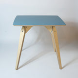 mid century style plywood dining table in blue