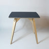 square plywood dining table with black top